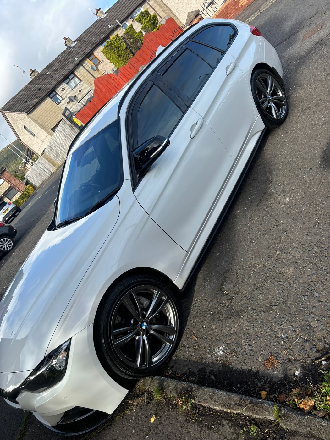 Finished white BMW after repair