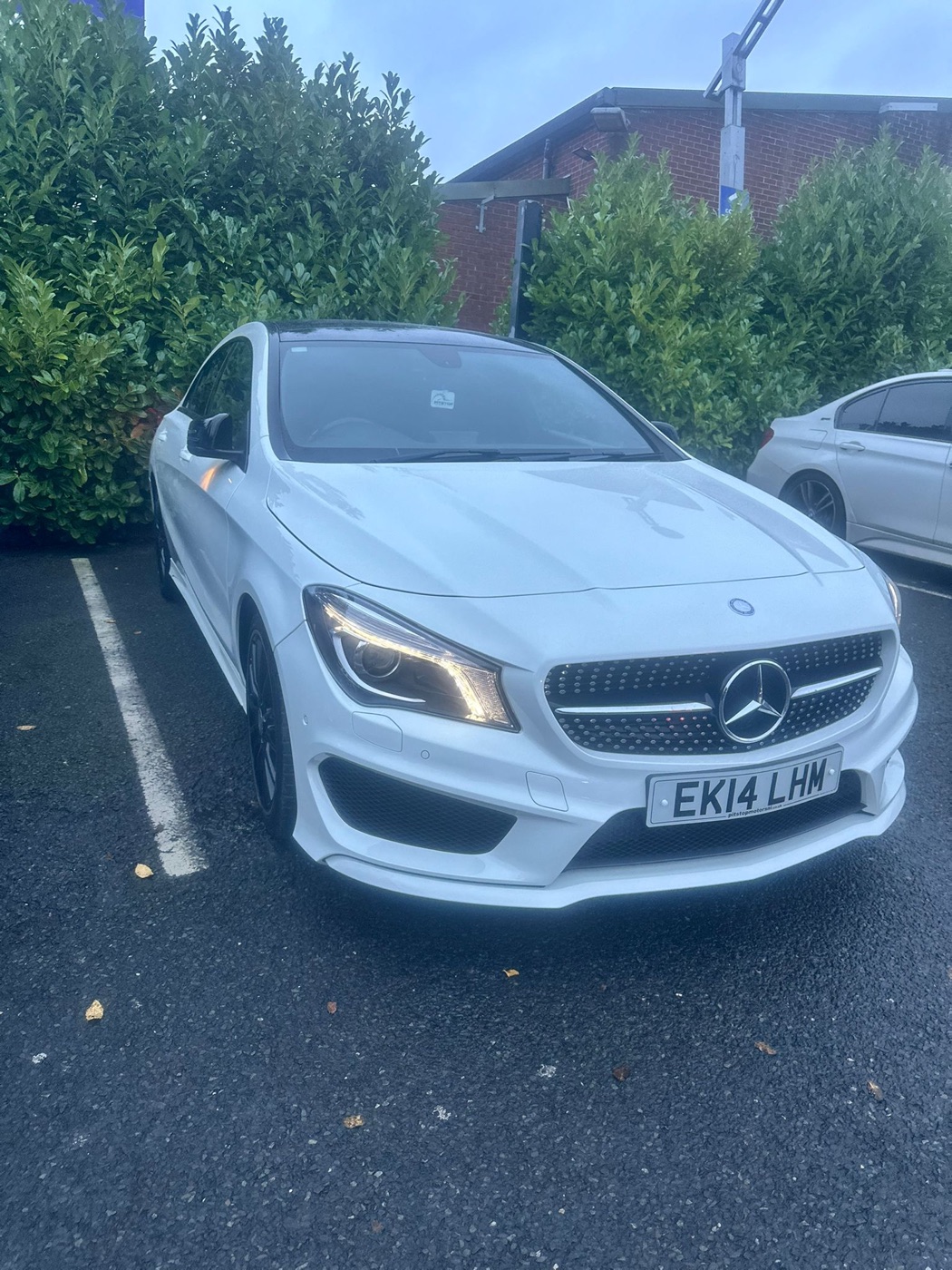 Finished white Mercedes after repair